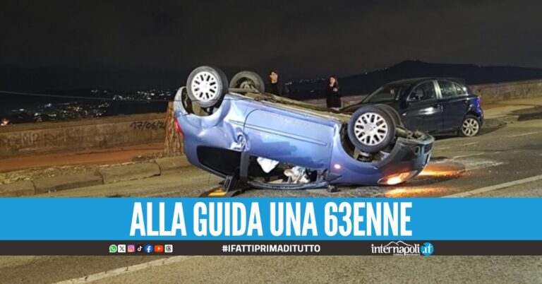 Paura in via Manzoni, si schianta contro un'auto in sosta e si ribalta