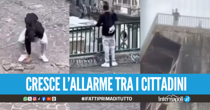 Lanciano pietre dal Belvedere di Posillipo lungo la strada: 